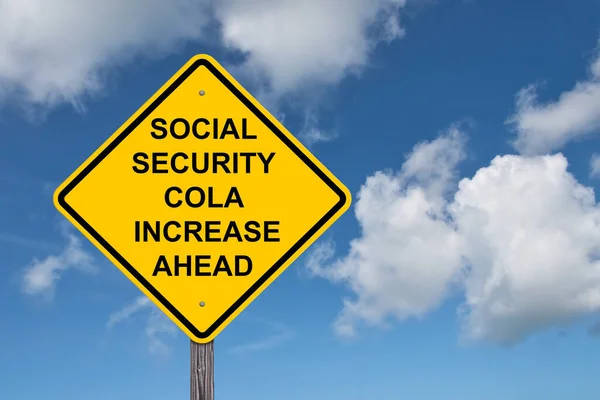 Social Security Cola Increase Ahead Caution Sign Blue Sky Background 로열티 프리 스톡 사진