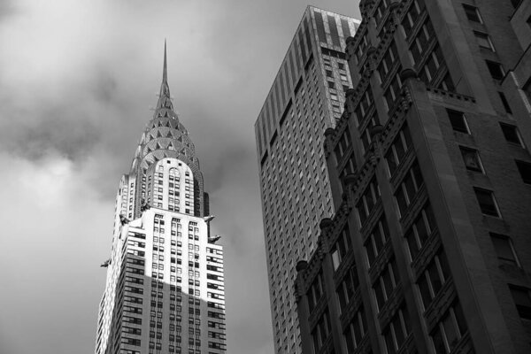 Skyline of midtown Manhattan in New York City with landmark skyscraper Chrysler Building