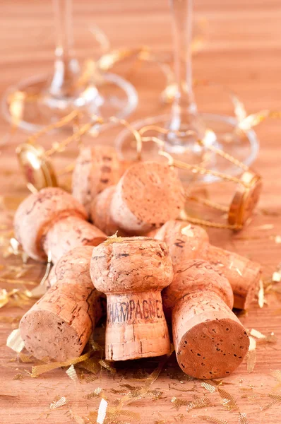 Champagne corks and gold glitter decoration — Stock Photo, Image