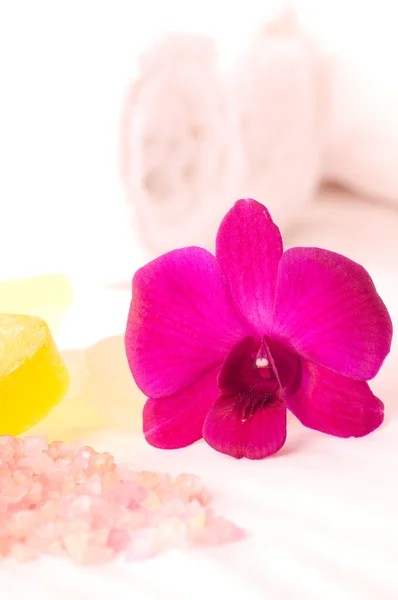 Spa concept orchids, towels, soap and bath salt close up — Stock Photo, Image