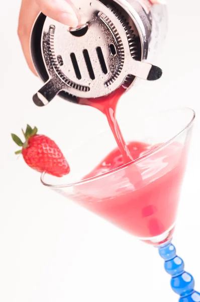 Strawberry Daiquiri being poured into a glass — Stock Photo, Image