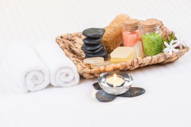 Spa amenities in a banana leaf basket clipart