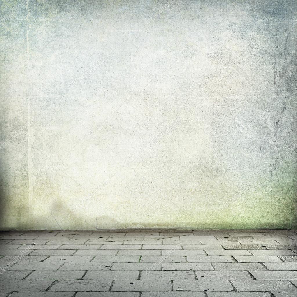 Grunge background old wall texture and sidewalk room interior without ceiling