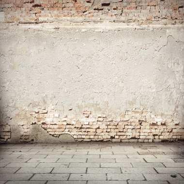 Grunge background, red brick wall texture bright plaster wall and blocks road sidewalk abandoned exterior urban background for your concept or project