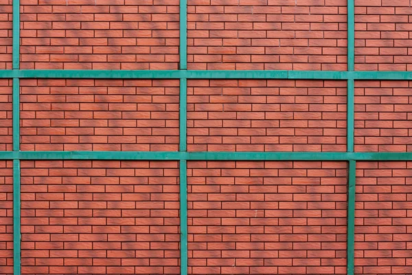 Parede de tijolo vermelho textura fundo urbano com linhas verdes — Fotografia de Stock