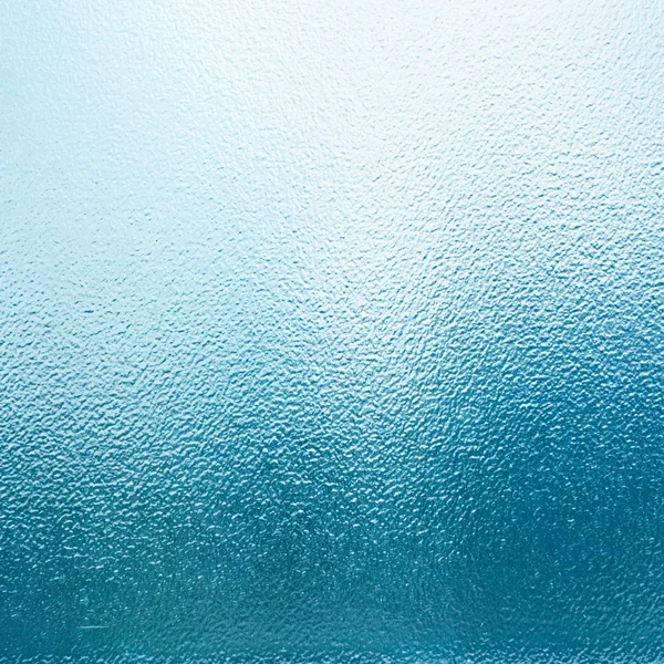 Синий абстрактный фон гладкой текстуры стекла — стоковое фото