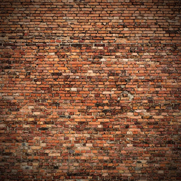 Rode baksteen muur textuur grunge achtergrond met vignetted hoeken naar interieur — Stockfoto