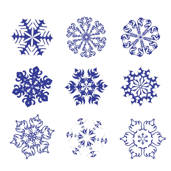 Conjunto de copos de nieve azules sobre un fondo blanco . — Archivo Imágenes Vectoriales