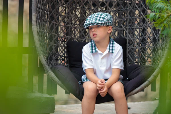 Portrait of a little boy outdoors in city — Stock Photo, Image