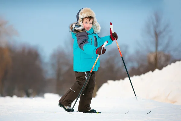 Cute little boy skiing on cross — Stock Photo, Image