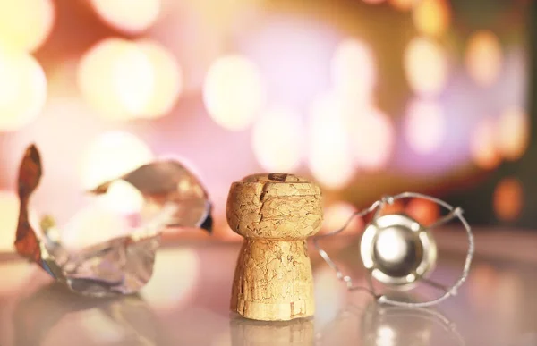 Cork Champagne Bottle Holding Wire Festive Bokeh Lights Background Holiday — Stockfoto