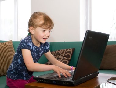 Little girl with notebook