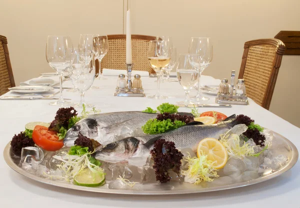 Fresh fishes on plate — Stock Photo, Image