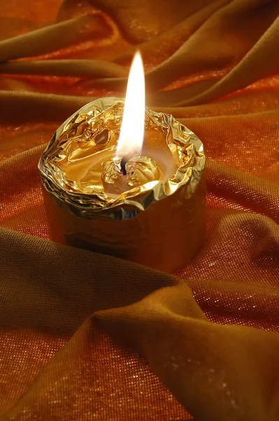 Gouden kaars — Stockfoto