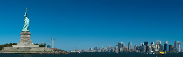The Statue of Liberty on Liberty Island, New York City panorama photo