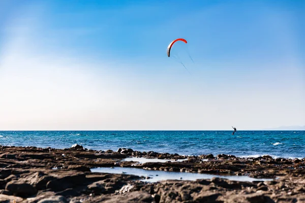 Man Kiteboarding Sea Water Surface Blue Sky Background Kitesurfing Cyprus — Stock Photo, Image