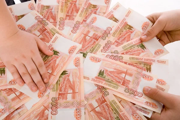 http://st.depositphotos.com/1281717/1048/i/450/depositphotos_10483141-The-hands-holding-Russian-banknotes.jpg