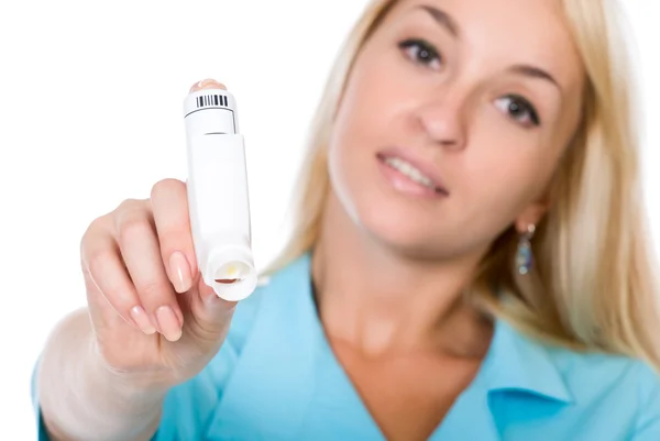 Beautiful doctor with an asthma inhaler — Stock Photo, Image