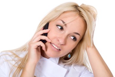güzel hemşire cep telefonuyla konuşuyor.