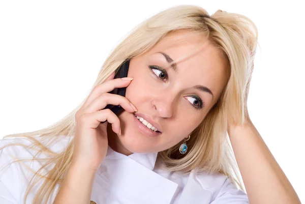 The beautiful nurse speaks by cell phone — Stock Photo, Image