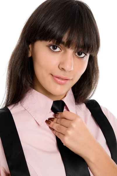 Portrait of a beautiful business girl straightens his tie — Stock Photo, Image