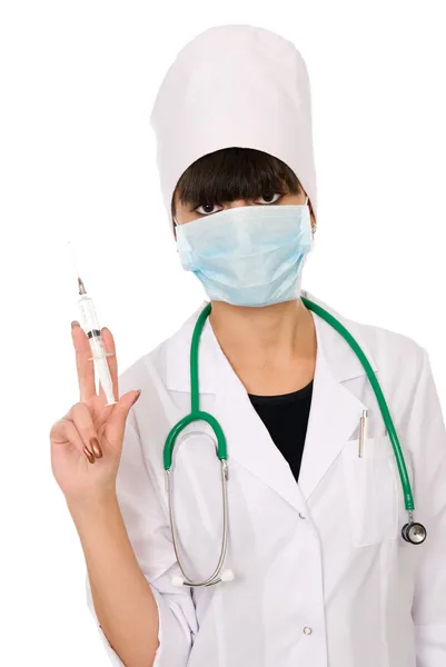 Doctor with a syringe and a mask — Stock Photo, Image