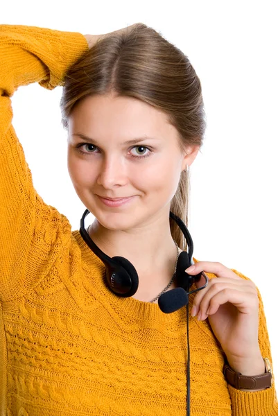 Hermosa mujer joven con auriculares con micrófono —  Fotos de Stock