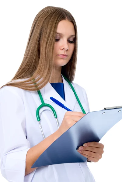 Female doctor taking notes — Stock Photo, Image