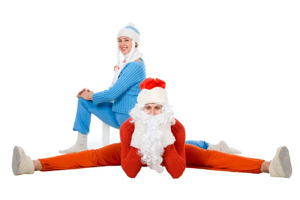 Santa Claus and the Snow Maiden of yoga. — Stock Photo, Image