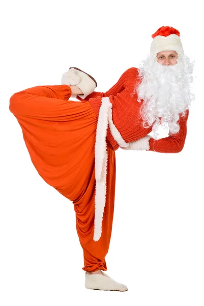 Санта-Клаус занимается гимнастикой — стоковое фото