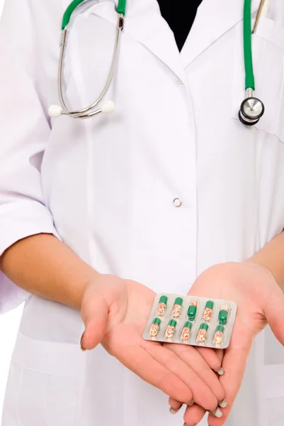 Doctor holding a pill — Stock Photo, Image