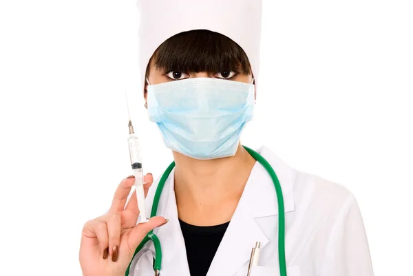 Doctor with a syringe and a mask — Stock Photo, Image