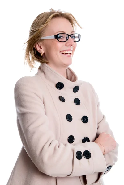 Portrait of a cheerful girl in a light coat — Stock Photo, Image