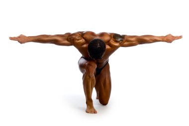 Muscular man with outstretched arms