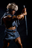 Картина, постер, плакат, фотообои "male warrior with a sword in the form of a barbarian", артикул 16931317