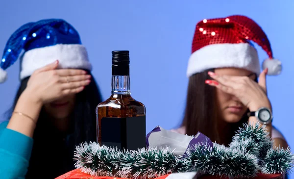 Rejection of alcohol two girls in the New Year hats — Stock Photo, Image
