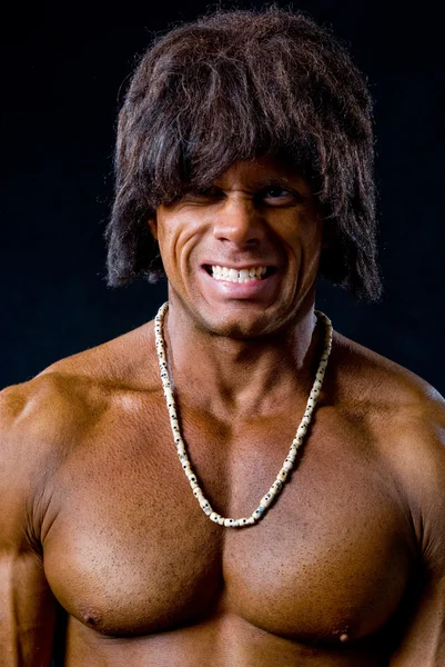 Portrait of muscular gay men with beads around his neck — Stock Photo, Image