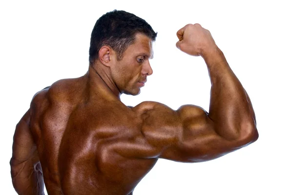 Bodybuilder tonen zijn spieren — Stockfoto