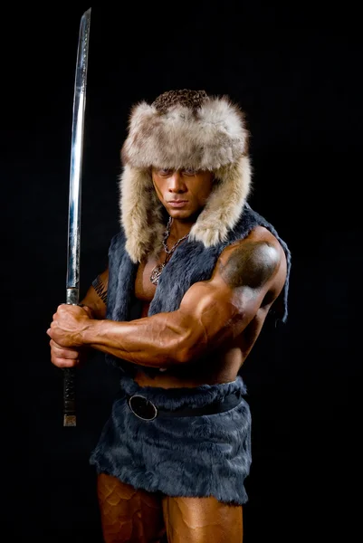 Male warrior with sword raised. — Stock Photo, Image