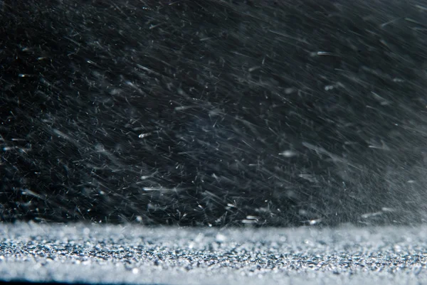 Natuurlijke achtergrond met regen sneeuwstorm — Stockfoto