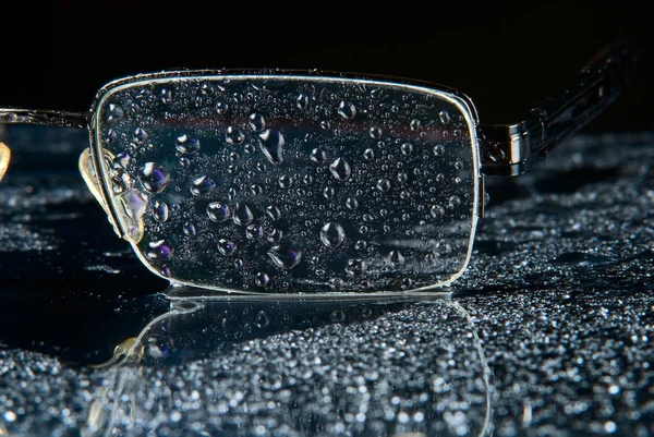 Close-up of water droplets on the glasses — Stock Photo, Image