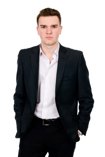 Portrait of businessman standing with his hands in the pockets — Stock Photo, Image