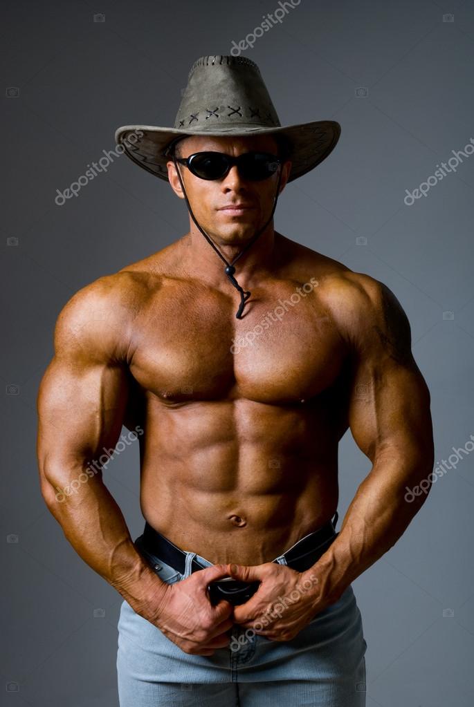 depositphotos_22696343-stock-photo-muscular-male-in-a-hat.jpg