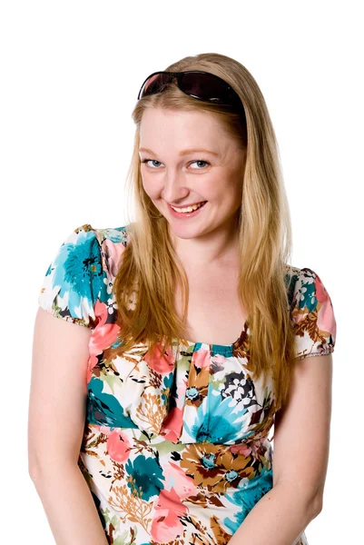 Portrait of a cheerful girl in a flowered dress — Stock Photo, Image