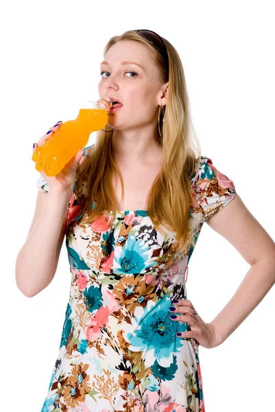 Portrait of young woman drinking juice — Stock Photo, Image