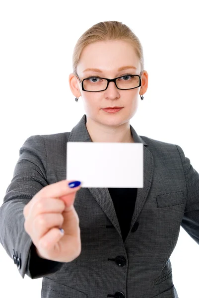 A beautiful woman holds out a business or credit card — Stock Photo, Image