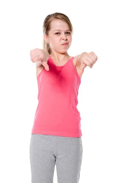 Young girl gesturing thumbs down — Stock Photo, Image