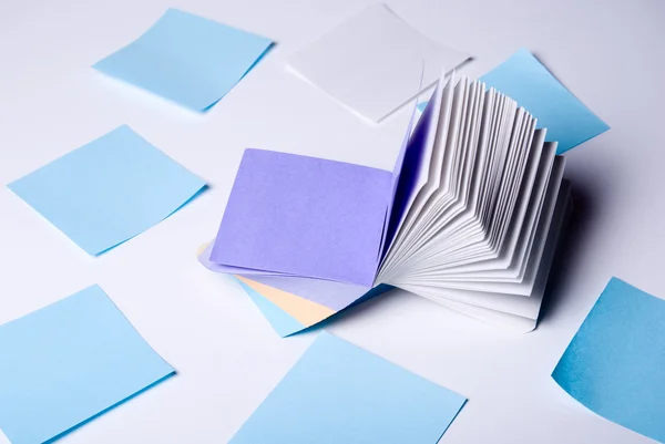 Stack of colorful. Paper records lying on a light background — Stock Photo, Image