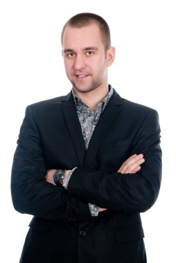 karşı duran bir gülümseyen genç işadamı portresi