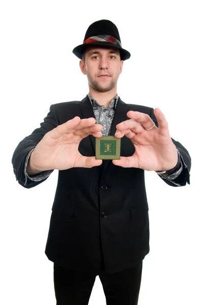 The man in the hat showing a microchip computer — Stock Photo, Image